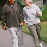 Generic older couple taking exercise.